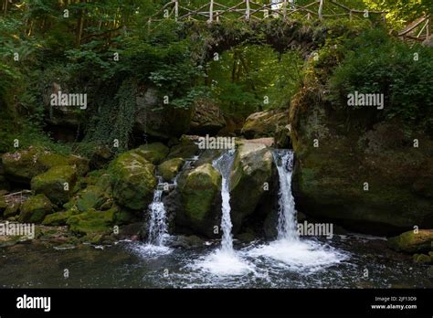 Waterfall The Schiessentumpel And Bridge In Luxembourg Stock Photo Alamy