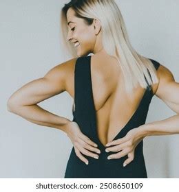 Blonde Woman Scoliosis Has Really Tense AI Generated Image 2508650109 Shutterstock
