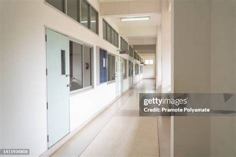 School Hallway With Lockers And People