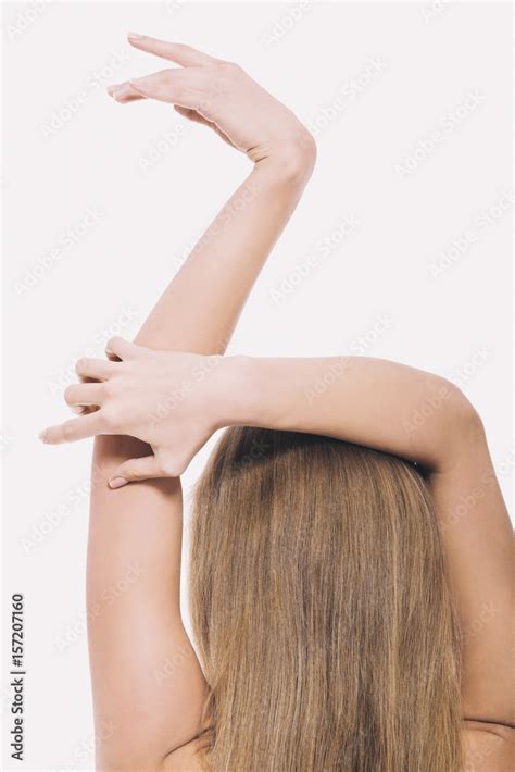 Back View Of Nude Woman Holding Arms Above Head Stock Photo Adobe Stock