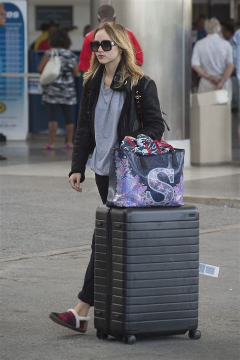 Suki Waterhouse - Arrives into Bridgetown Airport in Barbados 12/21