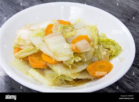 Stir Fry Chinese Cabbage With Garlic Sliced Carrots And Clear Bean