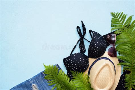 Female Summer Bikini Swimsuit And Accessories Collage On Blue With Palm