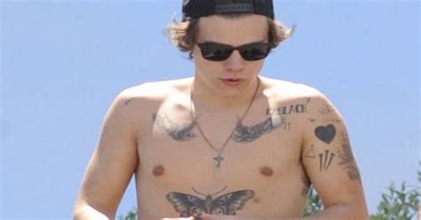 Harry Styles Gets Half Naked And Shows Off Tattoos Ok Magazine