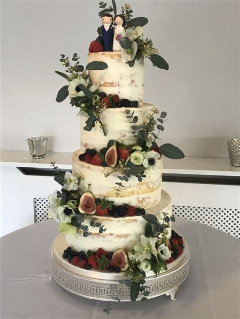 Tier Semi Naked Wedding Cake Decorated With Fresh Wintery Themed Flowers Foliage And Fresh