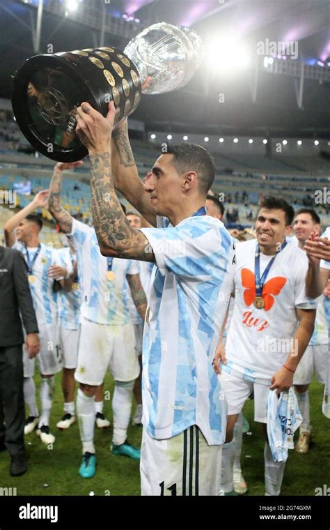 Angel Di Maria of Argentina celebrates with the trophy after winning ...