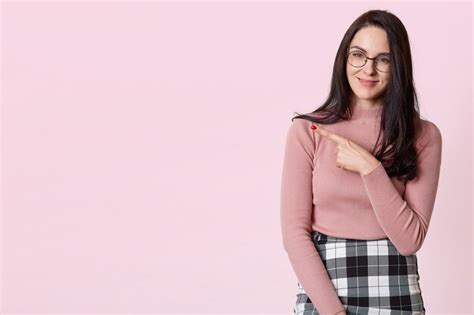 Premium Photo Indoor Studio Shot Of Pleasant Brunette With Sincere Smile On Her Face
