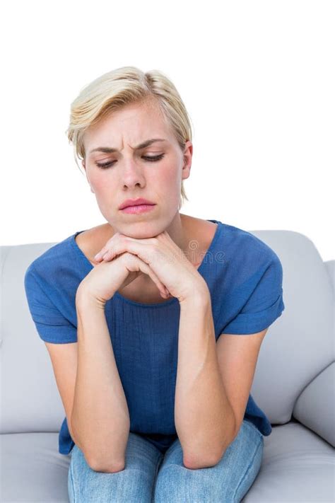Thoughtful Blonde Woman Sitting On The Couch Stock Photo Image Of Short Anxious