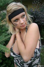 Busty Babe Malina May Strips Her Sexy Army Outfit Photos