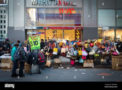 City Street Vender Selling Bags Stock Photo Alamy