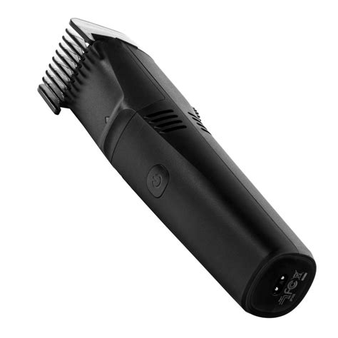 The Messless Vacuuming Beard Trimmer Hammacher Schlemmer