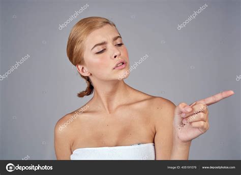 Woman Blonde With Bare Shoulders Clear Skin Face Naked Shoulders Cream Spa Salon Gray Background