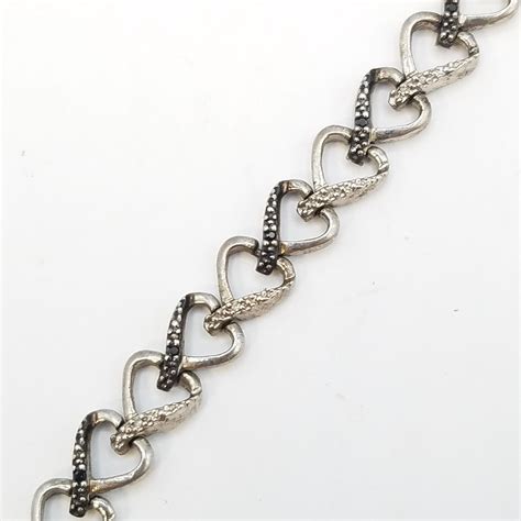 Buy The Sterling Silver Clear And Black Diamond Heart Link Bracelet 100g