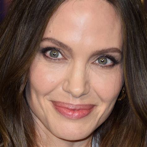How Angelina Jolies Blue Eyes Became A Symbol Of Timeless Beauty In
