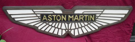 Bonhams Cars : An Aston Martin garage display emblem,