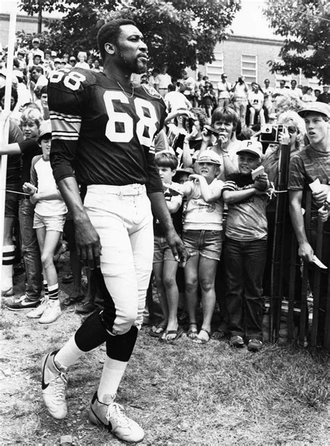 L.C. Greenwood with his fans