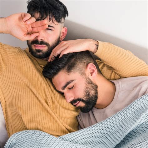 Free Photo An Overhead View Of Gay Couple Relaxing On Sofa