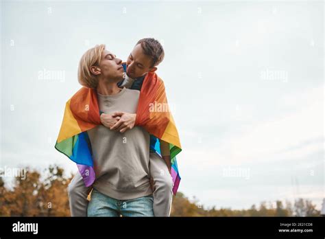 Romantic Gay Couple Hugging Kissing And Holding Hands Outdoors Two Handsome Men Holding Lgbt
