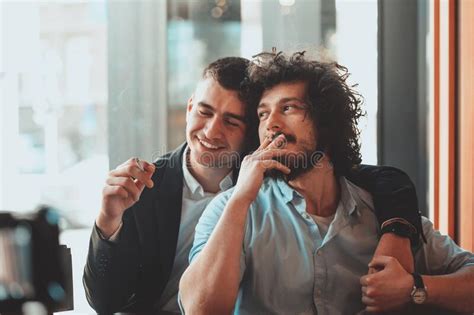 Portrait Of Multiethnic Diverse Gay LGBT Romantic Male Couple Embracing And Showing Their Love