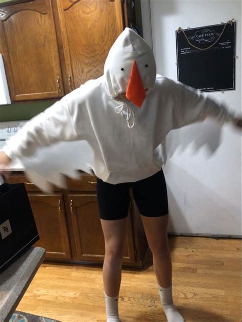 A Person In A Duck Costume Is Dancing