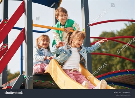 On Playground Kids Having Fun Together Stock Photo 2393498331
