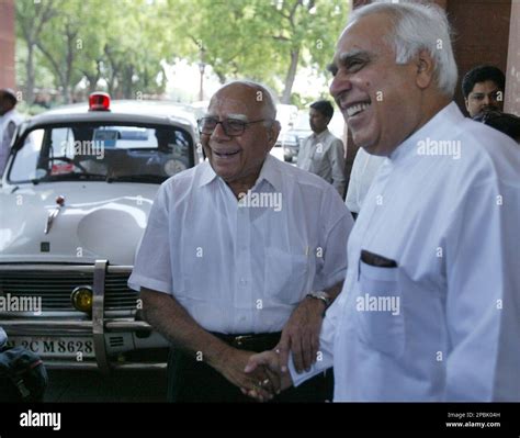 Indian Minister For Science And Technology Kapil Sibal Right Shakes