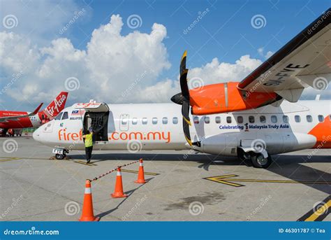 Air Asia And Firefly Airplane At Penang International Airport Editorial
