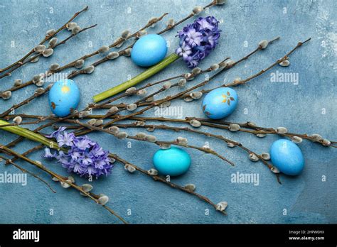 Pussy Willow Branches Painted Easter Eggs And Hyacinth Flowers On Blue Background Stock Photo