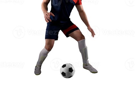 Close Up Of A Football Action Scene With Soccer Player Chases A