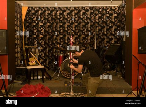 stage man band concert performance preparation one Stock Photo - Alamy