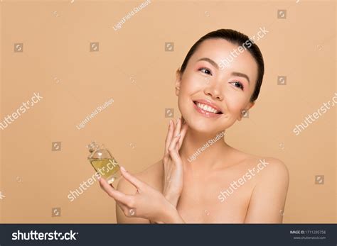 Beautiful Smiling Naked Asian Girl Applying Stock Photo Shutterstock