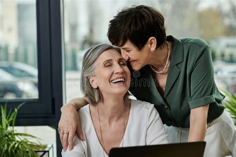 Two Mature Women Embrace Lovingly In Stock Image Image Of Teamwork Couple