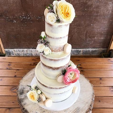 Beautiful Semi Naked Wedding Cake With Fresh Flowers And Macarons