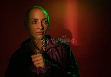 Woman With Nude Makeup Posing While Looking Away At The Studio Stock Photo Image Of Bald