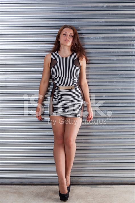 Brunette In A Striped Mini Dress Stock Photo Royalty Free FreeImages