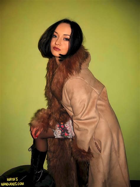 Hot Chick Maya Showing Her Tits While Posing In A Coat Photos
