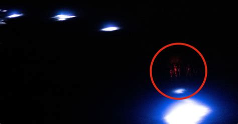 Astronaut Photographs Glowing Orbs Far Below Space Station