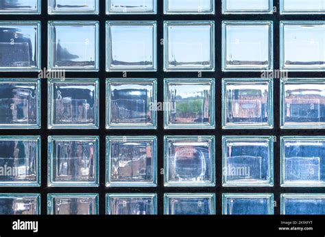 Looking through a facade made of translucent, or semi-transparent glass ...