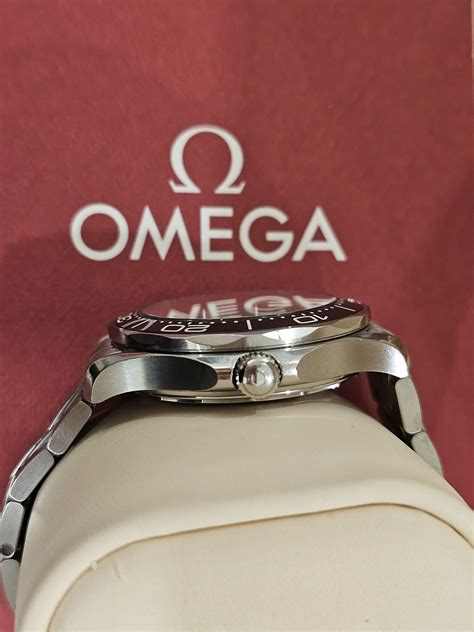 Omega Seamaster M Black Wave Dial THE WATCH BABE