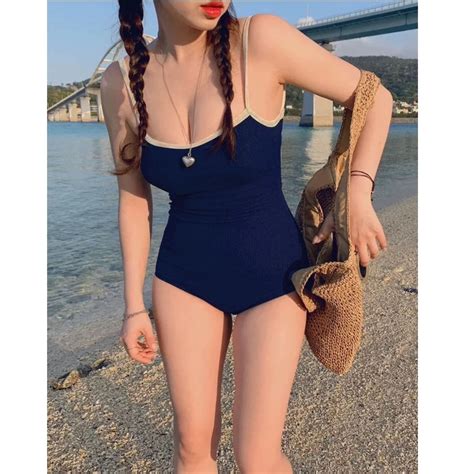 BIKINI LOẠI Bikini nữ liền mảnh đồ bơi nữ đi biển khoét lưng màu xanh đen viền dây BE cột