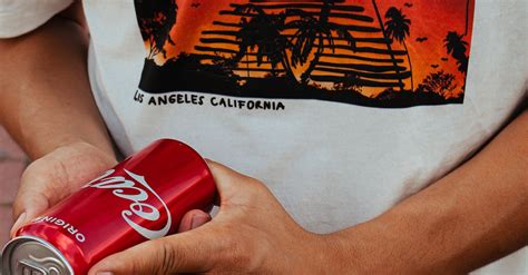 A Person Holding Coca Cola Can · Free Stock Photo