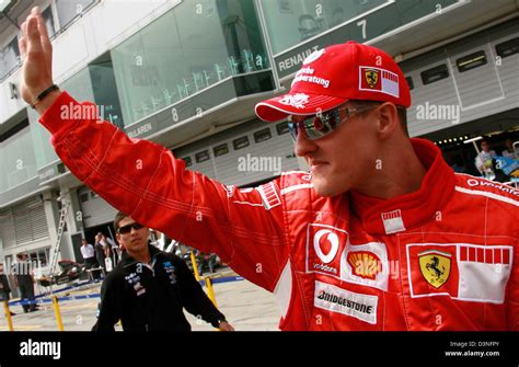 German Formula One Pilot Michael Schumacher Of Scuderia Ferrari Waves