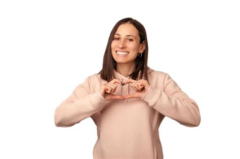 Premium Photo Wide Smiling Woman Is Making The Heart Gesture Over Her