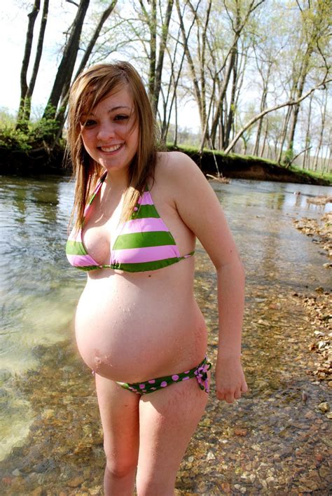 Pregnant Girl In A Swimsuit On The River Porn Pic