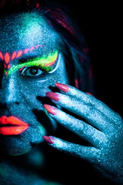 premium photo portrait  woman  multi colored face  black