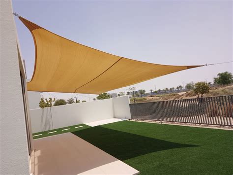 Non Tensioned Curved Shade Sail Installed In Emaar South Umbrella