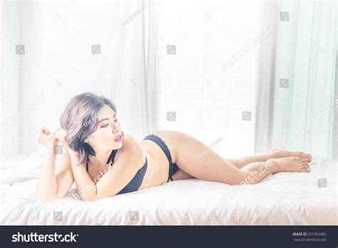 Sexy Asian Woman Black Bikini Lying Stock Photo 331953983 Shutterstock