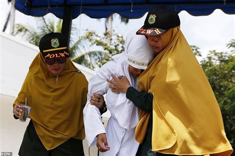 Indonesian Woman Is Caned In Public For Having Sex Outside Marriage Photos