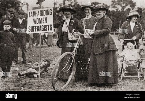 Suffragettes In Holding A Placard Which Reads Law Abiding Women