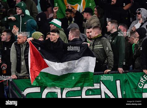 Celtic Supporters With Palestine Flag During The Champions League Group
